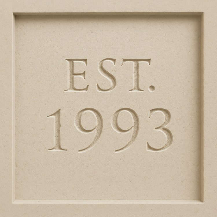 EST. 1993 carved relief